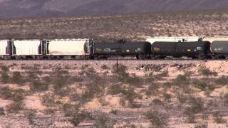 preview picture of video 'BNSF Needles sub - two manifest trains at Ash Hill'
