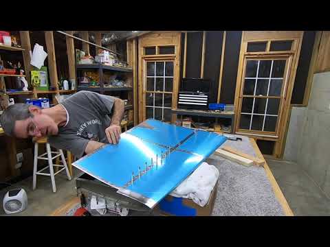 RV-10 Build Log - Emp 15 - Riveting the VS skin to the front spar