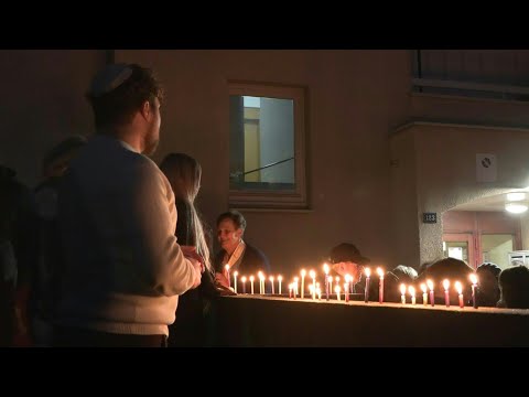 Video | Vigil near Paris for French victim of Bondi Beach mass shooting | AFP