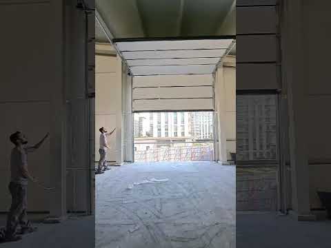 sectional door with manual operation