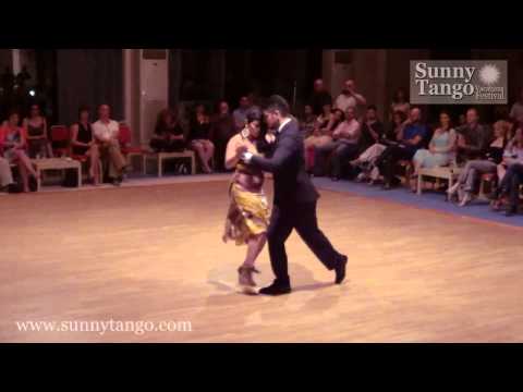  Sebastian Jimenez  and  Maria Ines Bogado  are  dancing  to  the  tango  "  Por La Vuelta  "  at  Sunny Tango Festival  in  2014