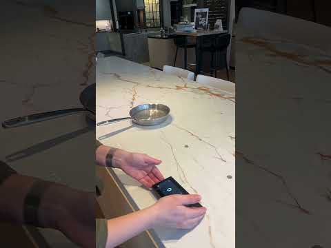 How does an invisible hob like the Novy Undercover work, and is it safe?