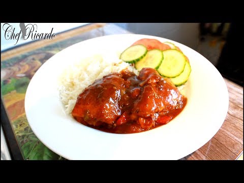BEST JAMAICA Brown stew chicken with rice and salad
