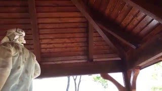 Staining a gazebo with Gray Away using a 12V sprayer.