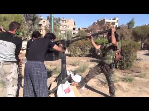 تجهيز الرشاشات الثقيلة للتصدي للطيران الحربي من قبل تجمع ألوية أحفاد الرسول في دير الزور