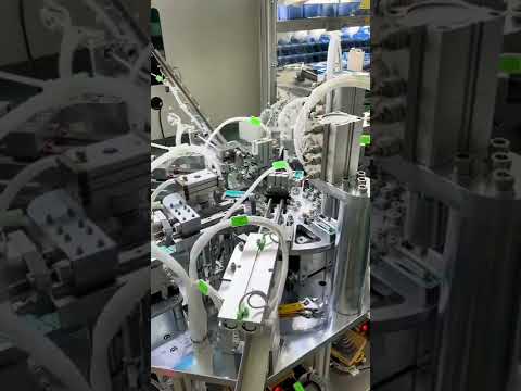 , title : 'Stapler clip parts automatic assembly machine running video'