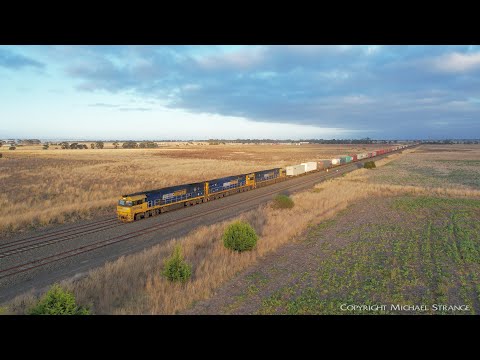 5AM5 Freight Train With NR110, 9323 & NR87 Filmed From Drone (8/4/2022) - PoathTV Australian Railway