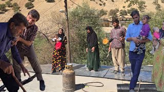 Atabek insulates the roof of the warehouse: Shahin helps him