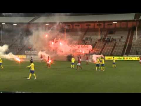 Antwerp Hools ruin the game with pyro and pitch invasion