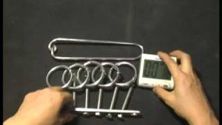 Slow motion----solving the 5-linked ring puzzle