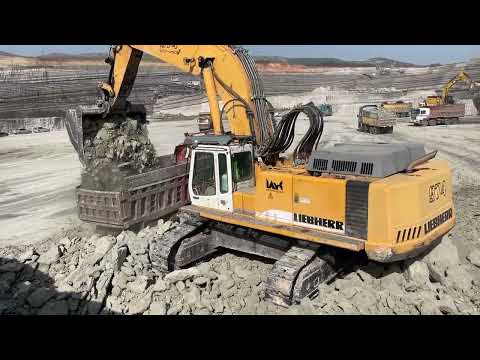 Liebherr 974 Excavator Loading Mercedes And MAN Trucks