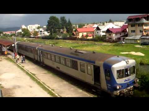 train arrival on small station in campulung-arges,romania