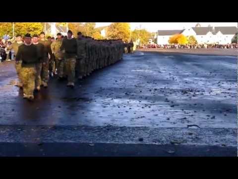 3 Rifles pass off the square at the Double