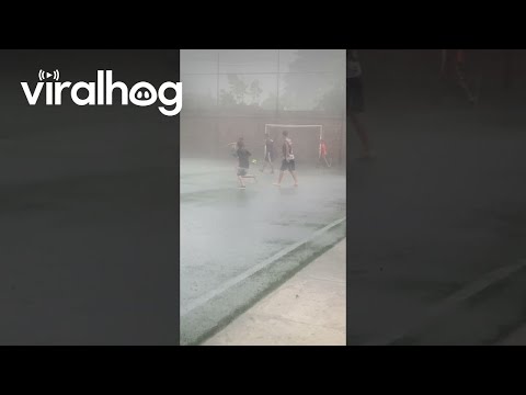 Playing Football In The Pouring Rain || ViralHog