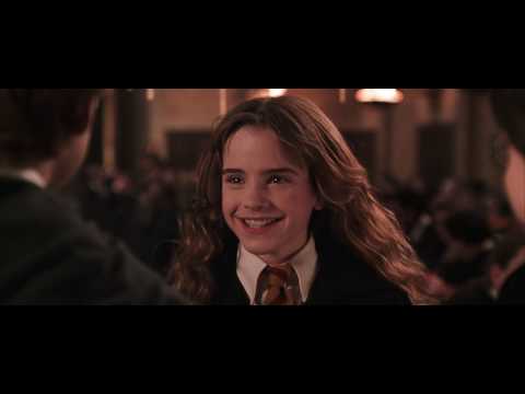 Hermione hugs Potter