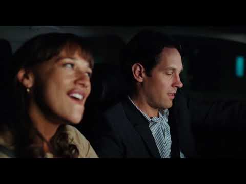 Trailer frame: wedding reception stage lights as the band launches into a Rush cover