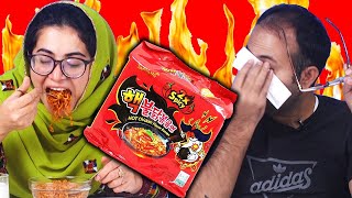 Trying the FIRE Noodles challenge for the first time (Reactistan Producers)