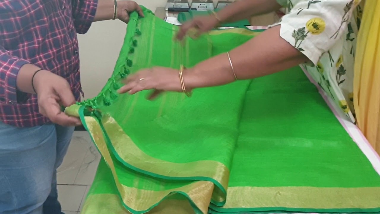 Parrot Green handwoven Linen Saree with Golden Zari Border