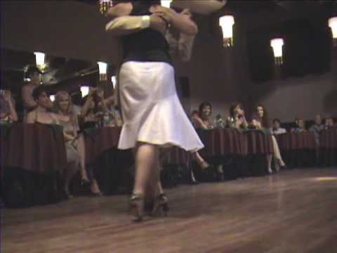  Abel Peralta  and  Liliana Godoy  are  dancing  to  a  tango