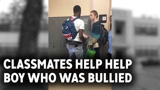 Classmates step in to help boy bullied over his clothes