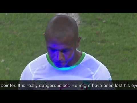 Korean football supporter attacked Algerian player's eyes by laser pointer?