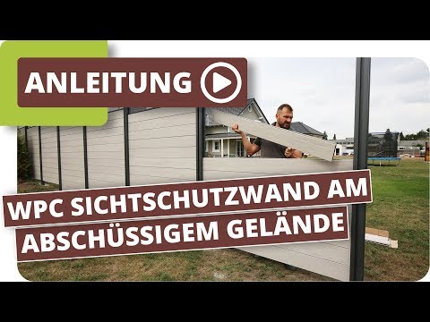 Sichtschutz im Garten mit Hanglage - planeo WPC Gartenzaun System