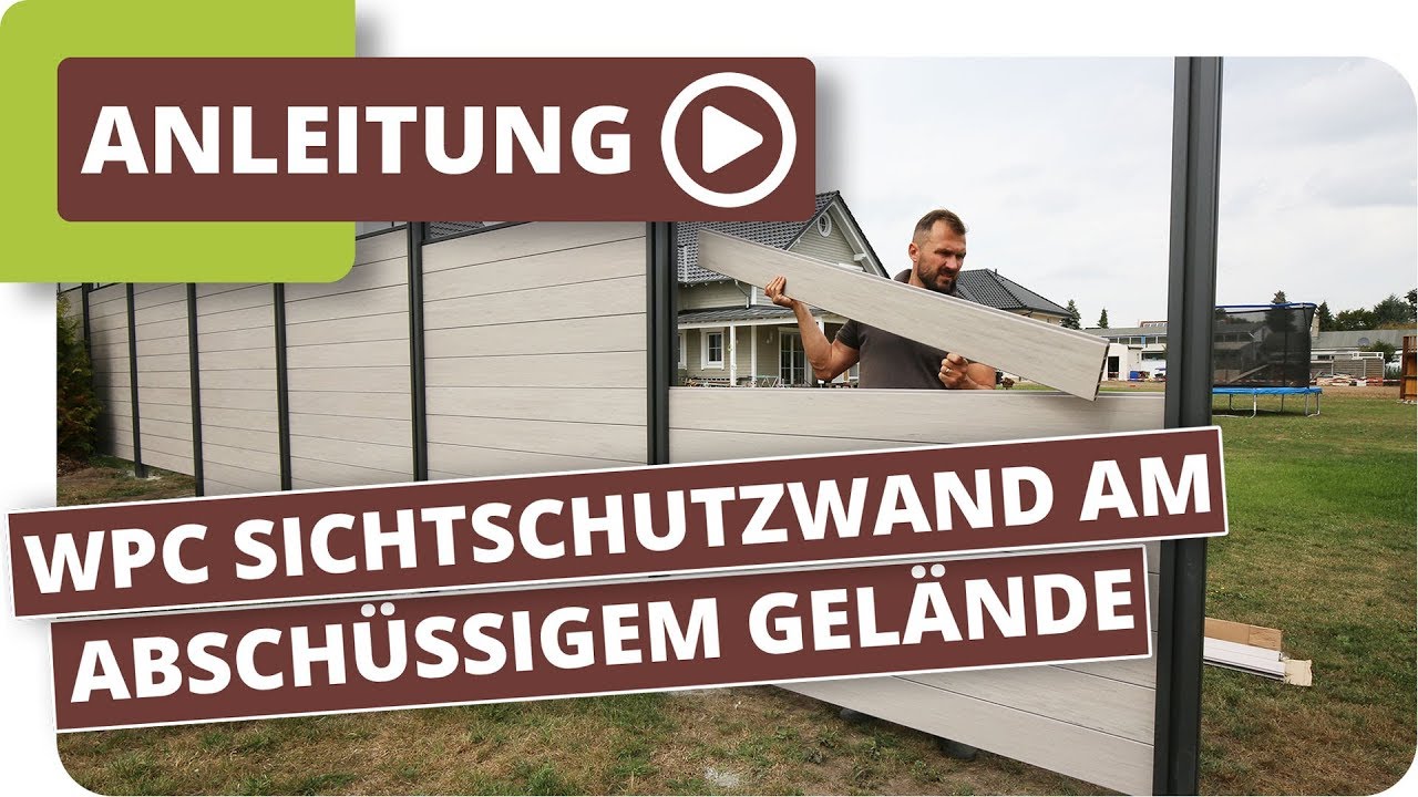 Sichtschutz im Garten mit Hanglage - planeo WPC Gartenzaun System