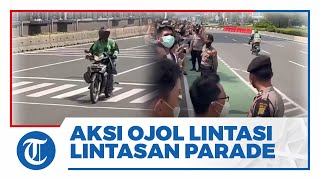 Video Detik-detik Aksi Ojol Santai Mengaspal di Jalur Parade MotoGP: Lewati Lintasan Bak Pembalap