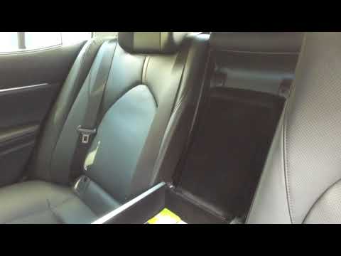 Новая Toyota Camry: Модифицируем подлокотник заднего дивана.