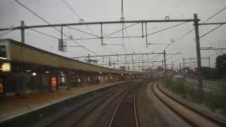 preview picture of video '[cabinerit] A train driver's view: Almere Centrum - Amsterdam CS, VIRM, 06-Sep-2014.'