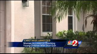 Woman accused of punishing children with &#39;electric chair&#39;