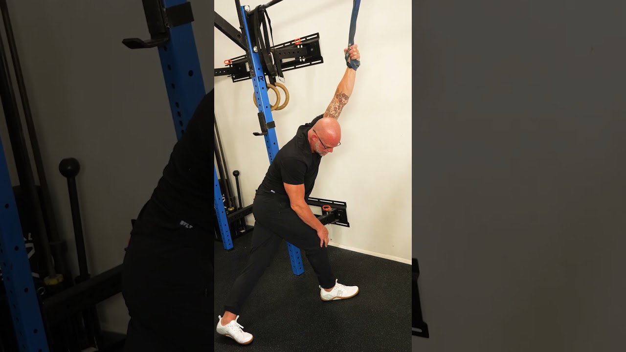Video thumbnail for Banded Overhead Lat Mobilization for Full Shoulder Flexion and Lateral Line Length