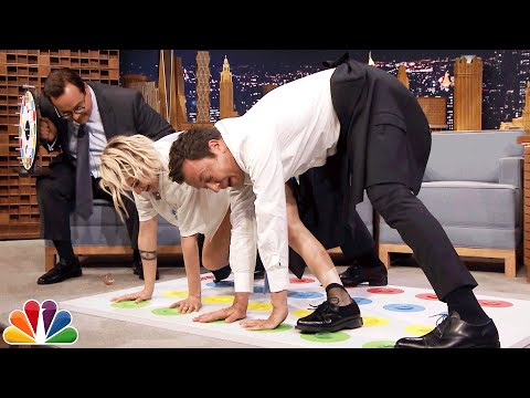 Kristen Stewart & Jimmy Fallon Get Intertwined & Intoxicated — See Who Collapses First In The Newest Tonight Show Frat Party Game, Jell-O Shot Twister!