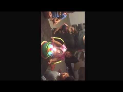 Bella blowing her cake with cousins, 3rd birthday