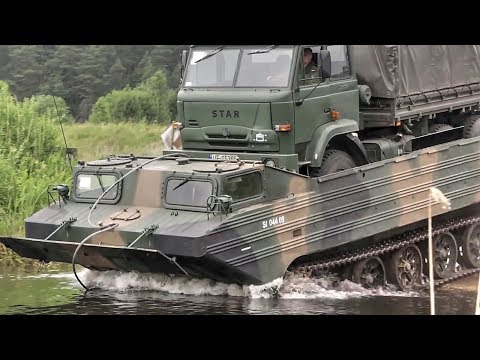 Polish Soldiers Use Soviet Era PTS Amphibious Vehicle To Carrie A Truck Across River