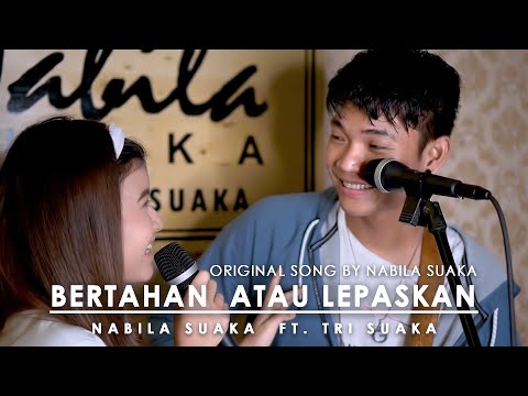 BERTAHAN ATAU LEPASKAN - NABILA (LIRIK) BY NABILA SUAKA FT. TRI SUAKA