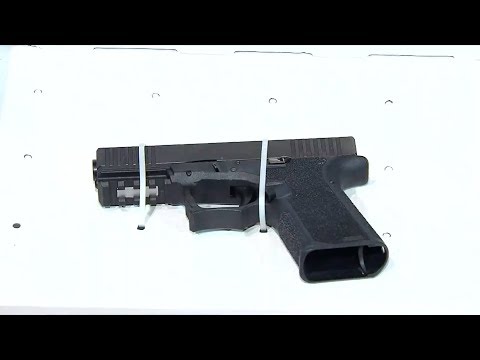 Hong Kong police seize pistol for first time during protests, arrest 11