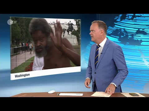 heute journal vom 24.07.2024 - Mann läuft durchs Bild und winkt in die Kamera