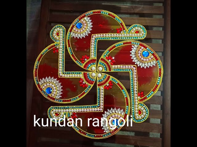 Diy kundan rangoli design of swatika by minakshi