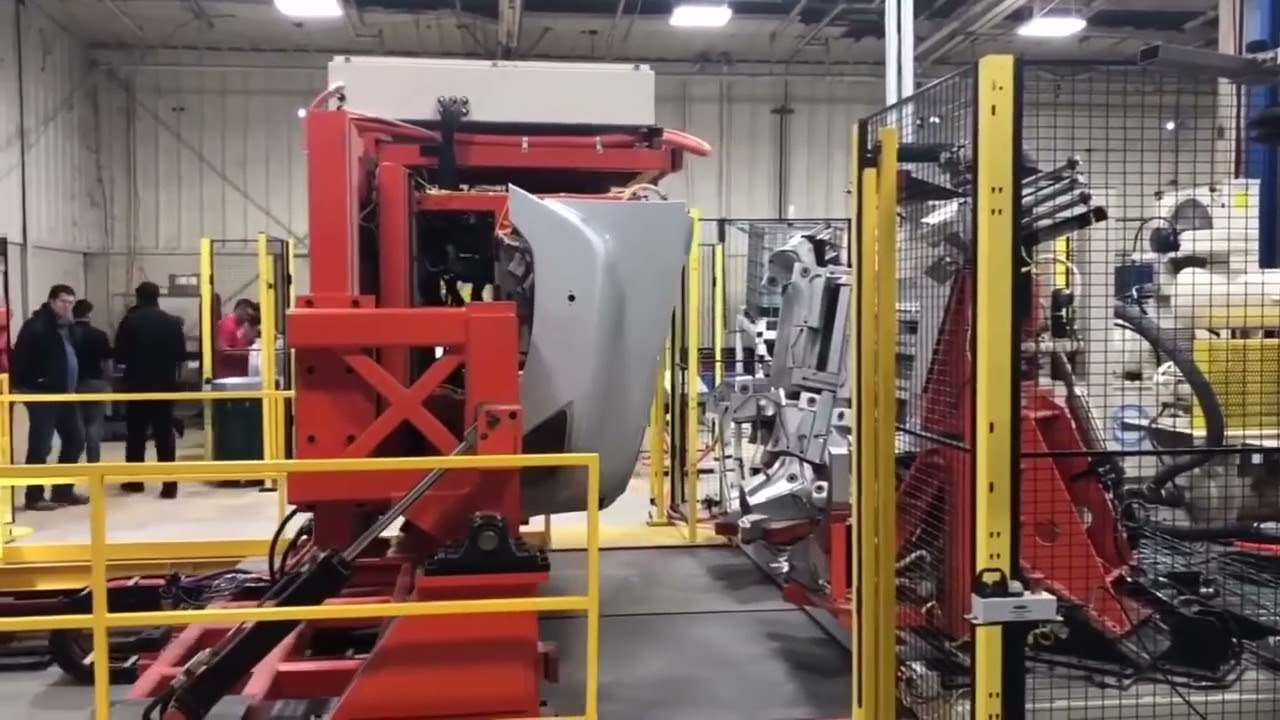 Large Truck Hood Fender Robot Bonding, Tooling Tech Group