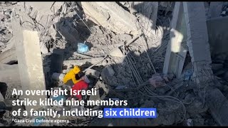 Palestinians inspect debris after Israeli strike on Gaza's Rafah