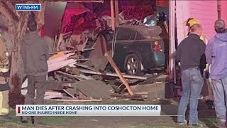 Car collides into Coshocton house; driver dies in crash