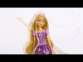 DISNEY PRINCESS dainuojanti lėlė Auksaplaukė (anglų kalba) (HPD41)