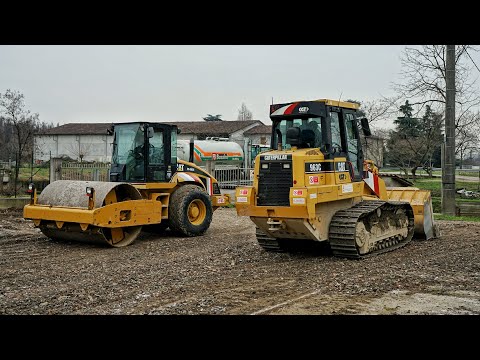 Sistemazione piazzale CATERPILLAR 963C / CS563E | Track loader digging