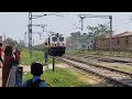 13043 Howrah Raxaul Express arriving Janakpur Road with HWH WAP5 and man standing dangerously close