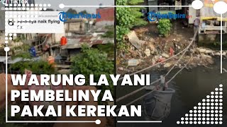 Viral Video Jajan Unik di Warung Pinggir Kali: Uang Ditaruh Ember, Dikerek, & Diisi Makanan Pesanan