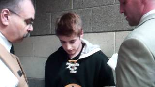 Download the video "bro spits on people at bruins game 3"