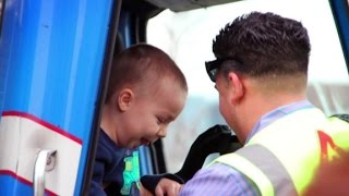 Garbage men make dying kid's dream come true