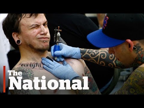 Tattoo particles migrating to lymph nodes