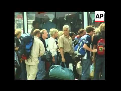 German plane carrying aid arrives; German tourist being evacuated